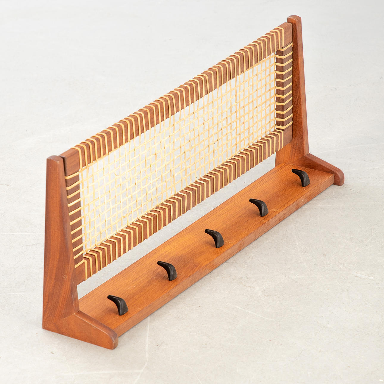 Teak, rattan coat rack, 1960s.