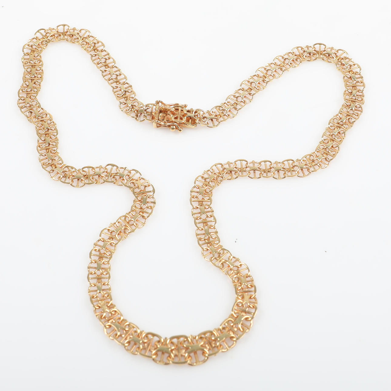NECKLACE, graduated x-link, 18K gold.
