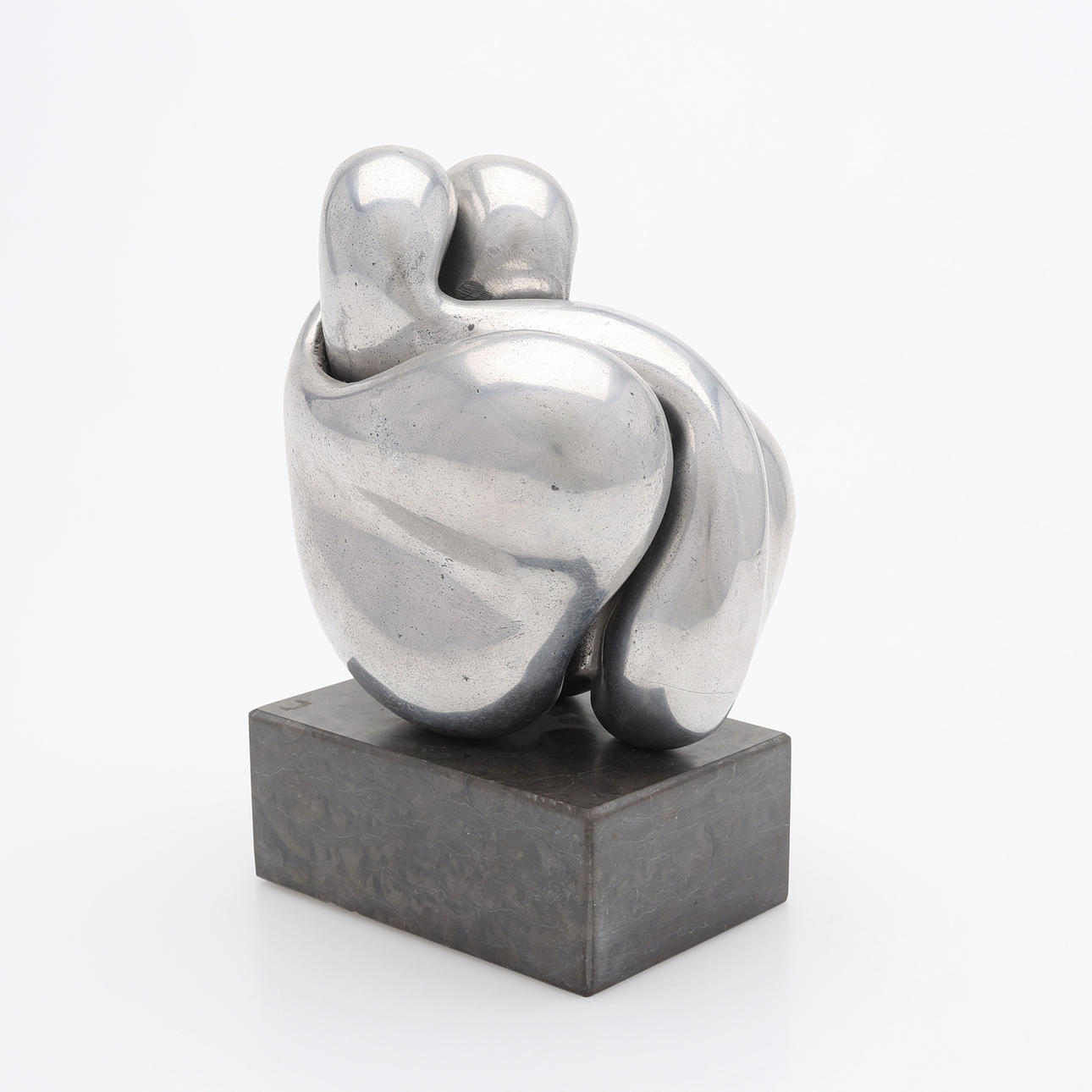 EVA ACKING. TWO-PART SCULPTURE, ALUMINIUM ON STONE BASE, MONOGRAM SIGNED, DATED -73, NUMBERED 1/10.