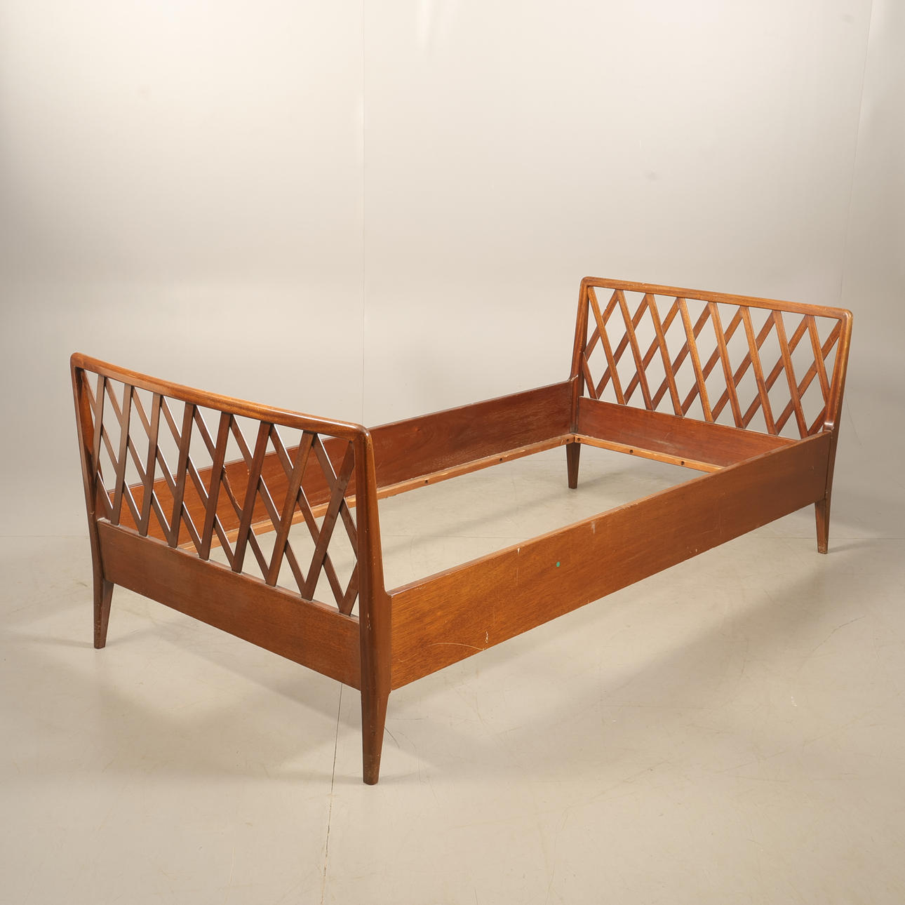 BED FRAME, mahogany, 1950s.