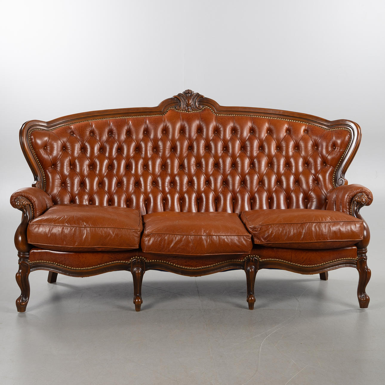 SOFA, Rococo style, leather upholstery, 20th century.