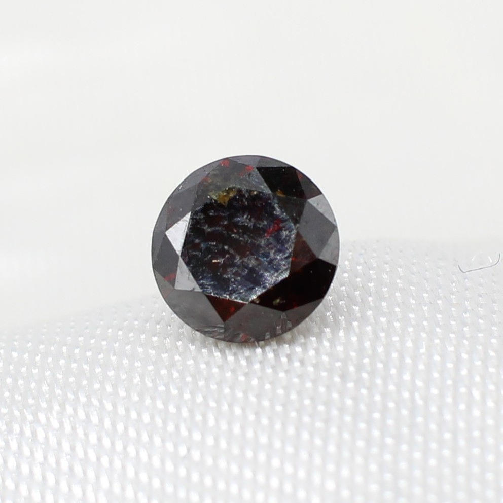 LOOSE ORANGE/BROWN DIAMOND 0.59CT.