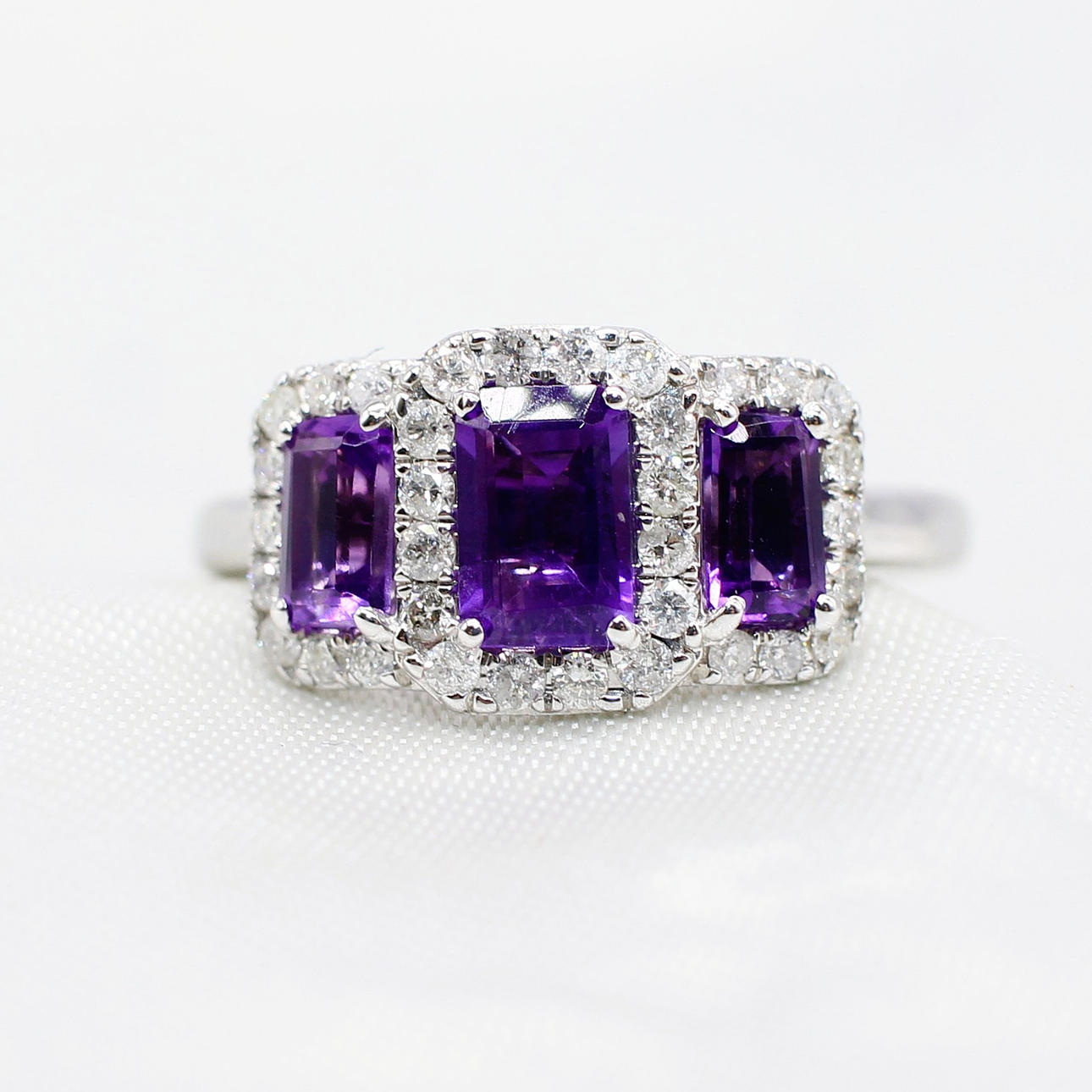 AMETHYST & DIAMOND TRILOGY CLUSTER RING.