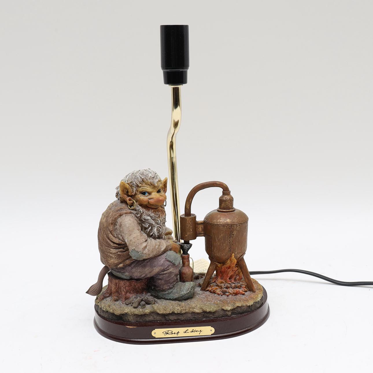 ROLF LIDBERG. Table lamp, composition, troll at a moonshine still.