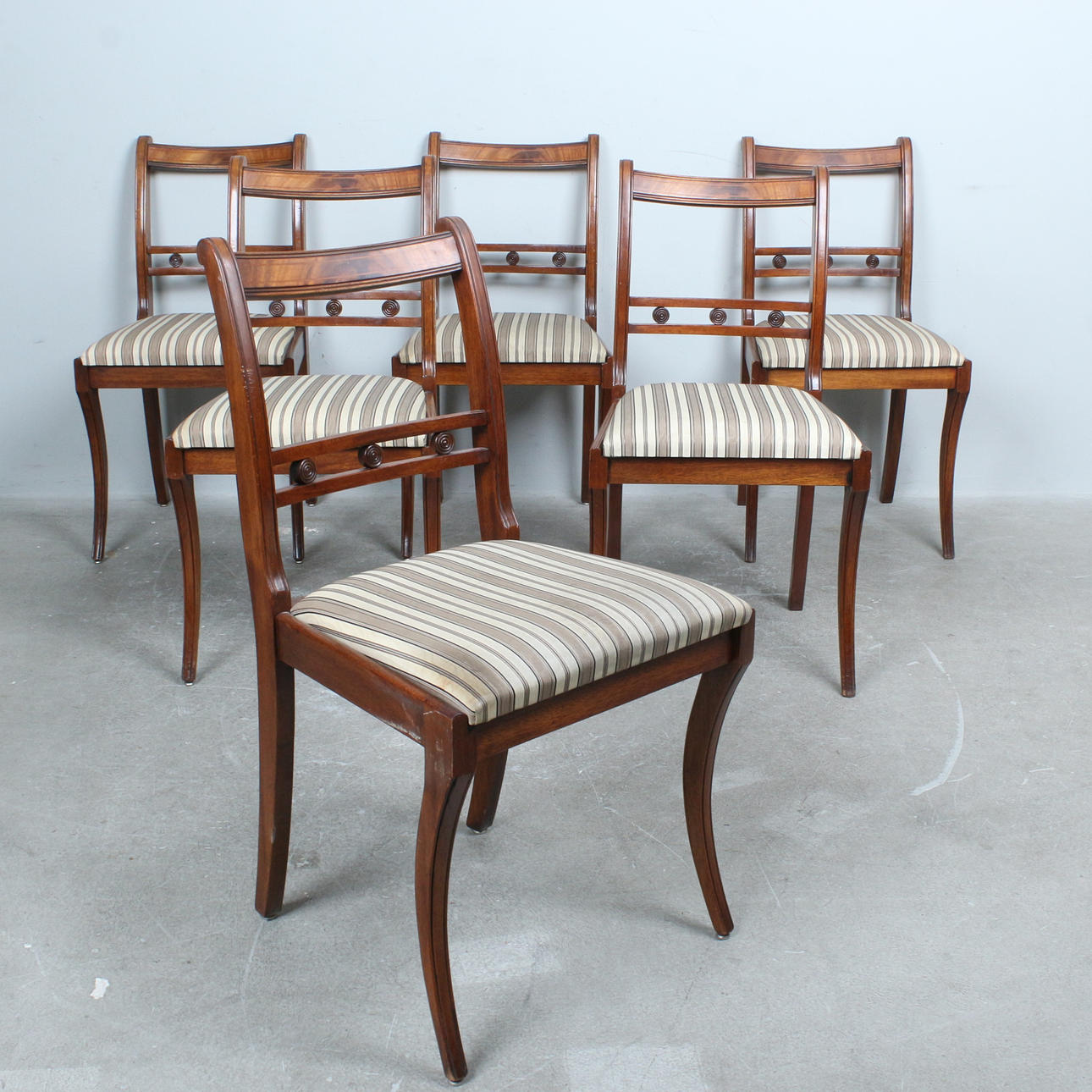 Six Regency-style dining chairs.
