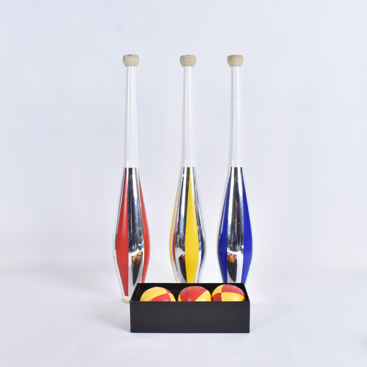 JUGGLING CLUBS AND BALLS, 2 boxes.