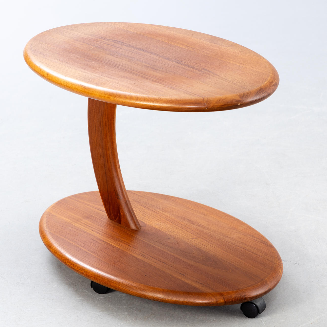 Coffee table / side table on casters in teak.