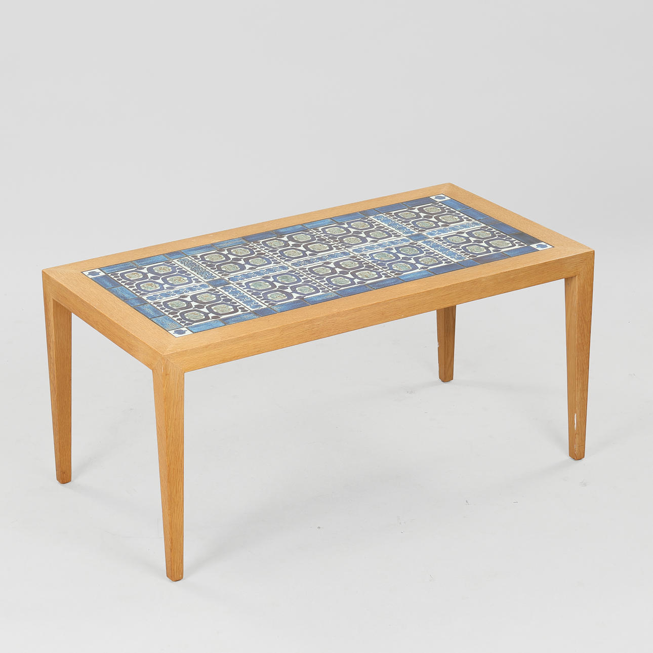 SEVERIN HANSEN. Haslev Møbelfabrik, rectangular coffee table in oak with 'Tenera' tiles from Royal Copenhagen, 1960s-70s.