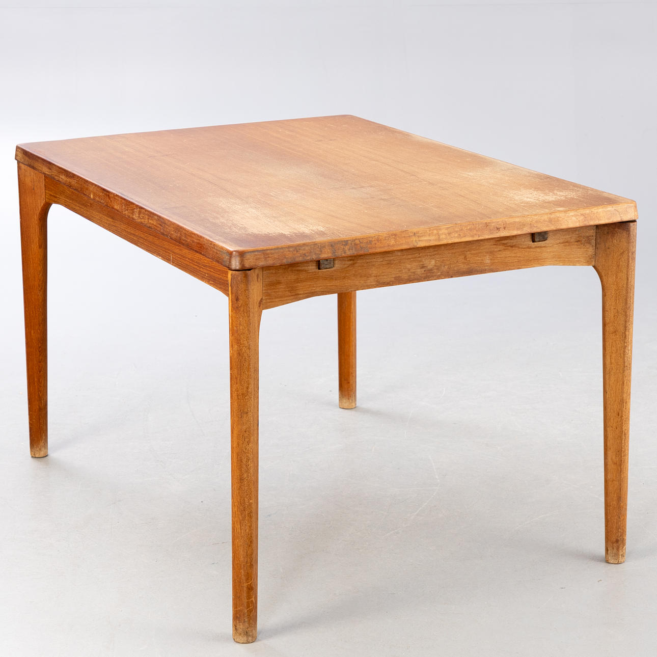 HENNING KJÆRNULF. VEJLE MØBELFABRIK. Extendable dining table, teak, Denmark.