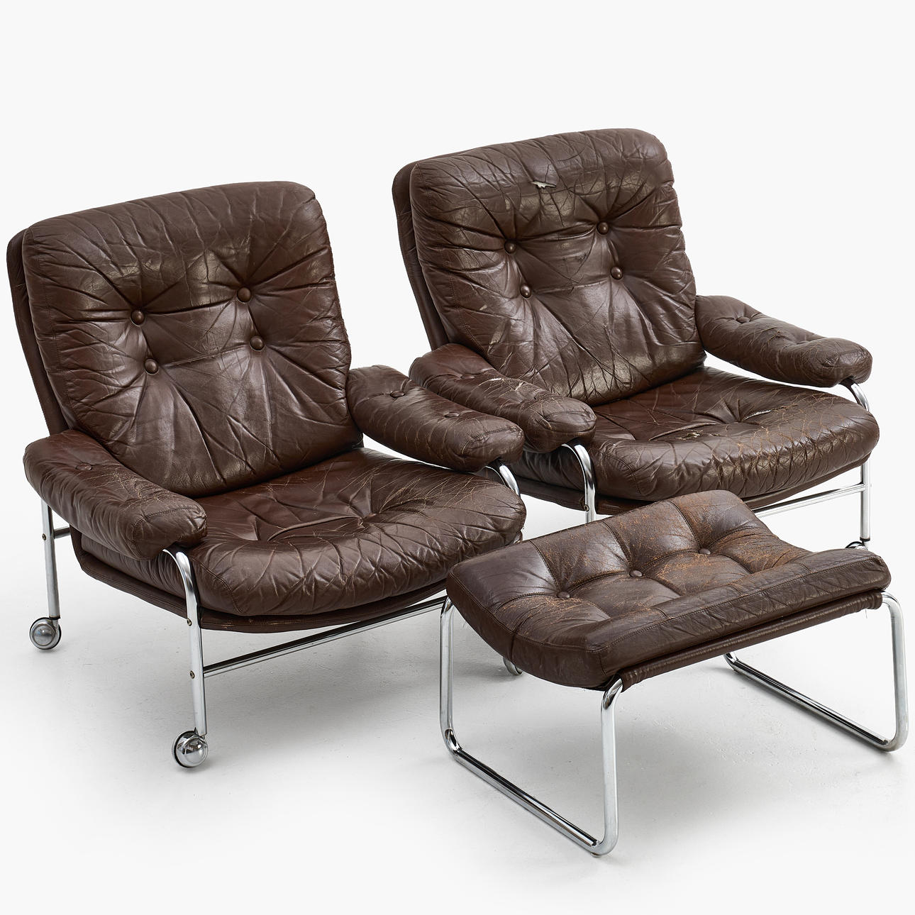 ARMCHAIRS, 1 pair, leather, one footstool, "Kimo", Ulferts 1970s.