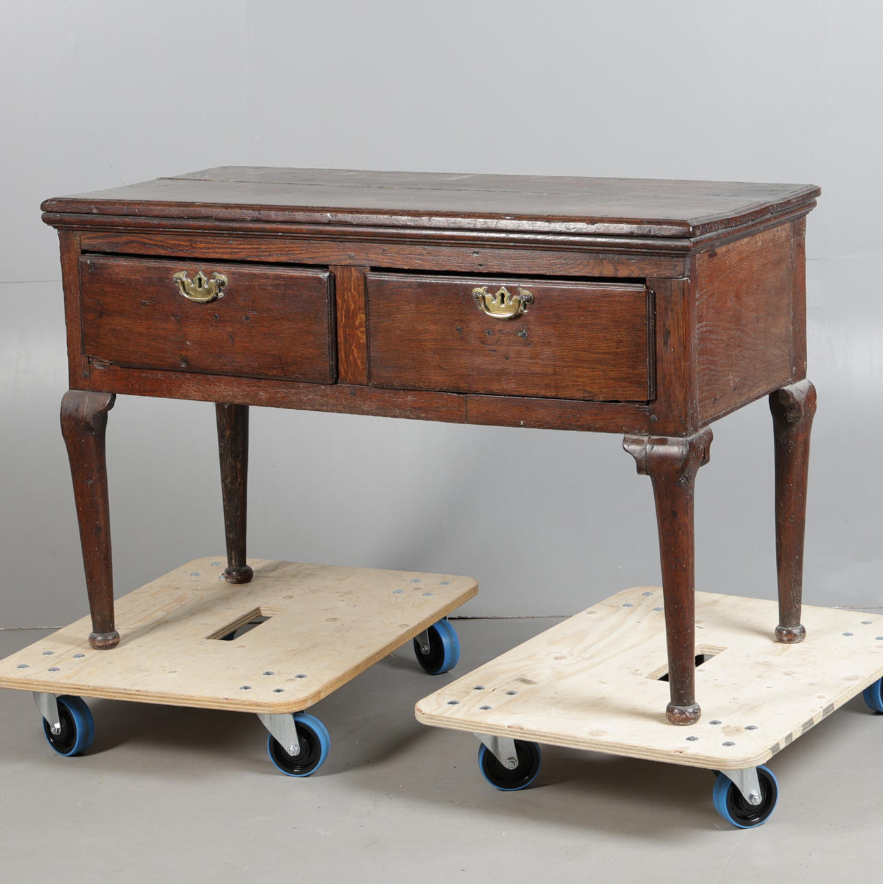 A GEORGIAN OAK DRESSER BASE.