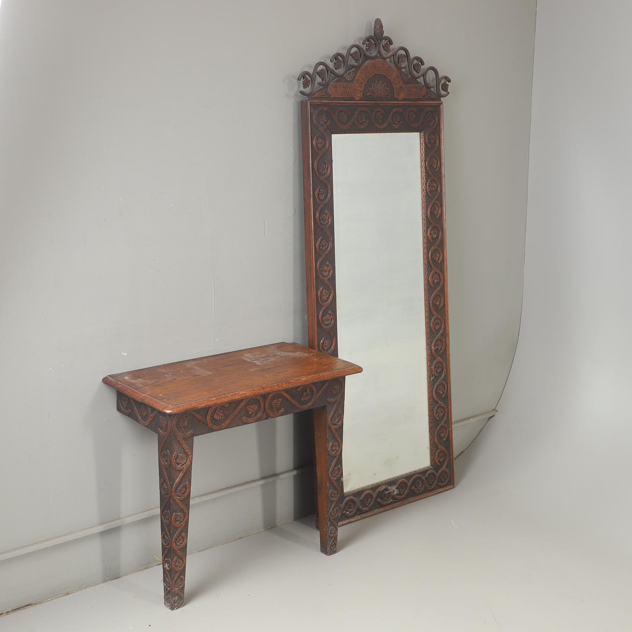 MIRROR AND CONSOLE TABLE, oak, dated 1902.