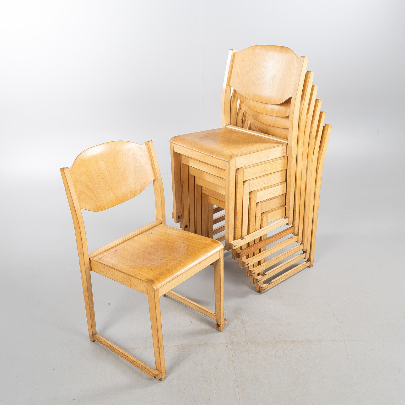 CHAIRS, 7 pieces, orchestra model, stackable, 20th century.