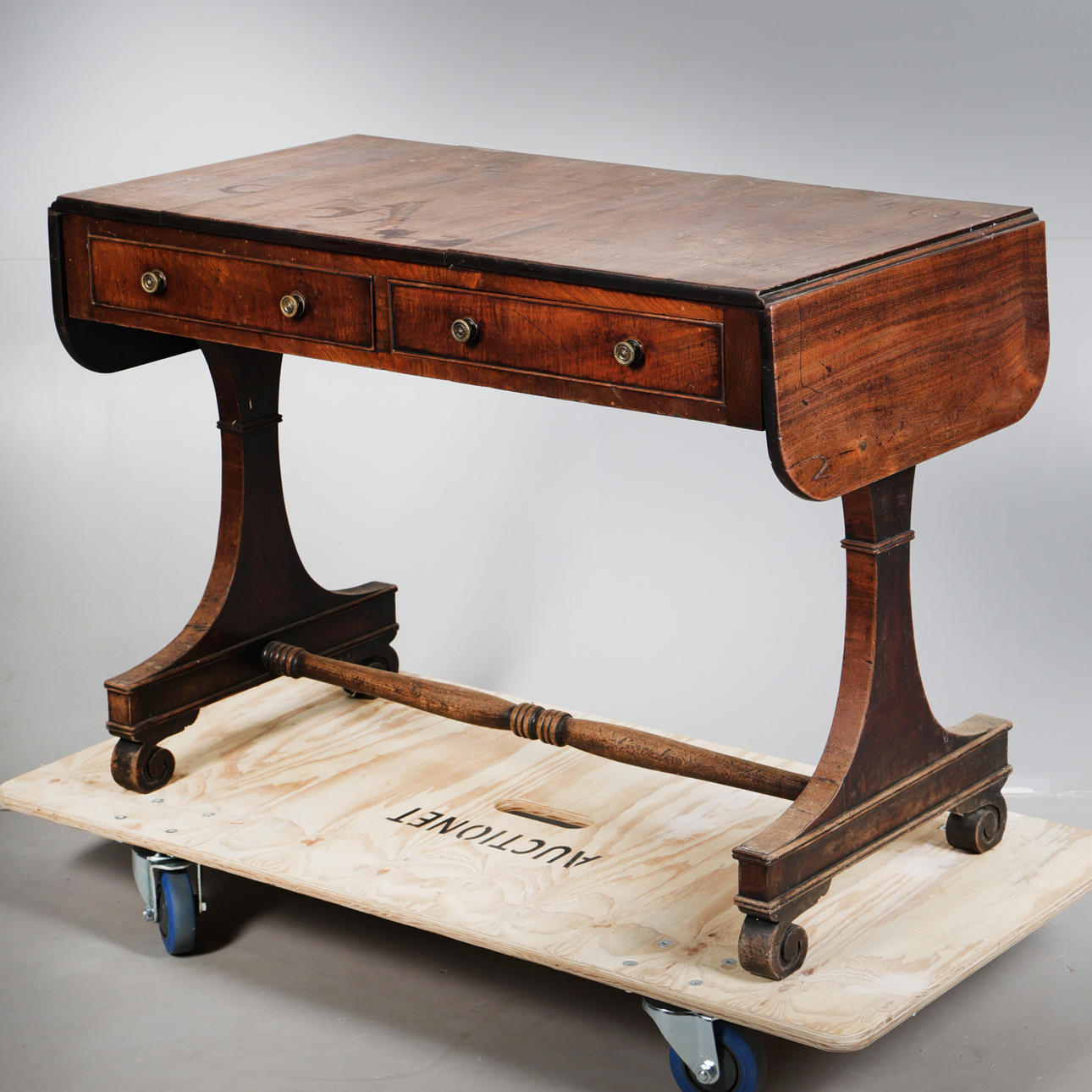 A REGENCY MAHOGANY SOFA TABLE.