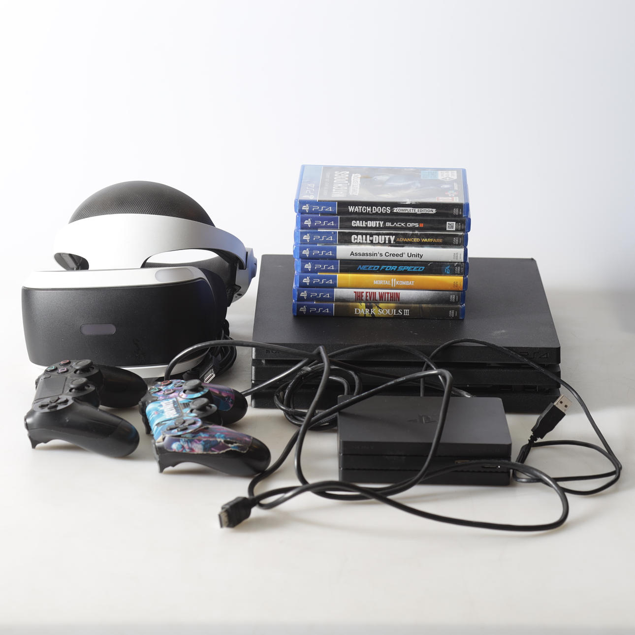 PLAYSTATION 4, games, controllers and VR headset.