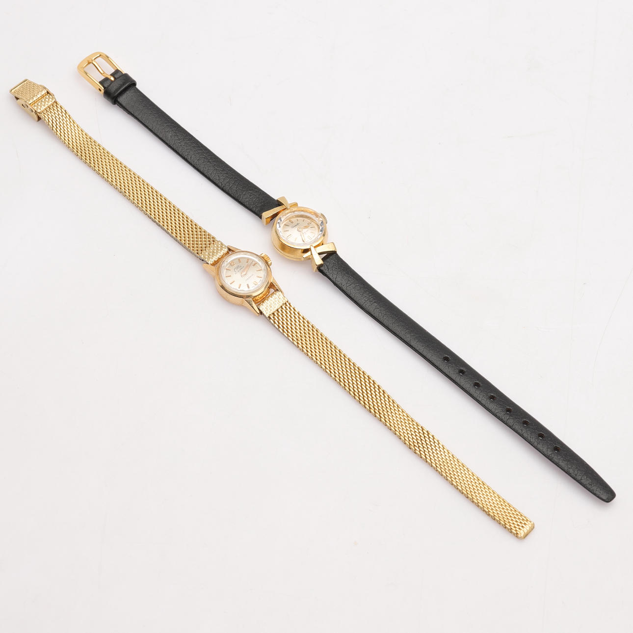 ARMBANSDUR, 2 st, 18K guld, b.la. Etna.