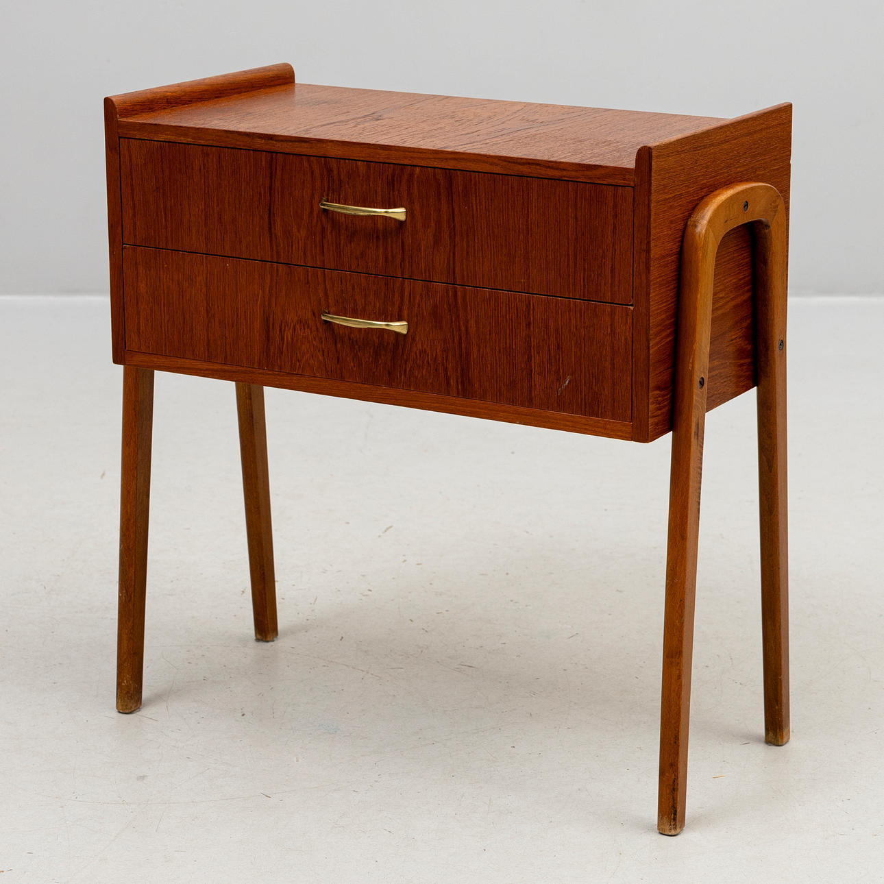 BEDSIDE TABLE, partially veneered in teak, 1960s.
