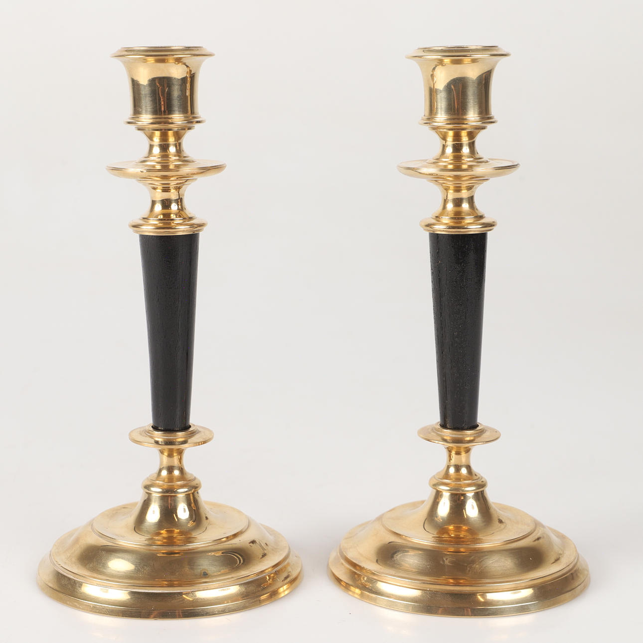 CANDLESTICKS, 1 pair, brass/wood, Skultuna.