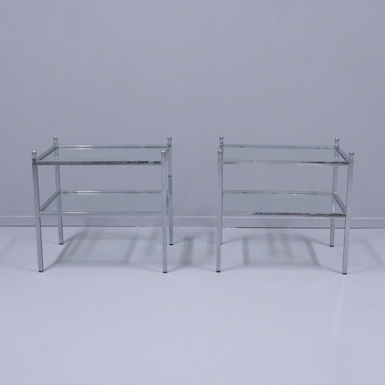 BEDSIDE TABLES, A PAIR. CHROME AND GLASS.