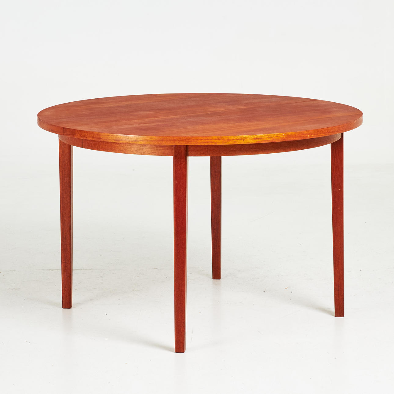 DINING TABLE. Mid-20th century, teak.