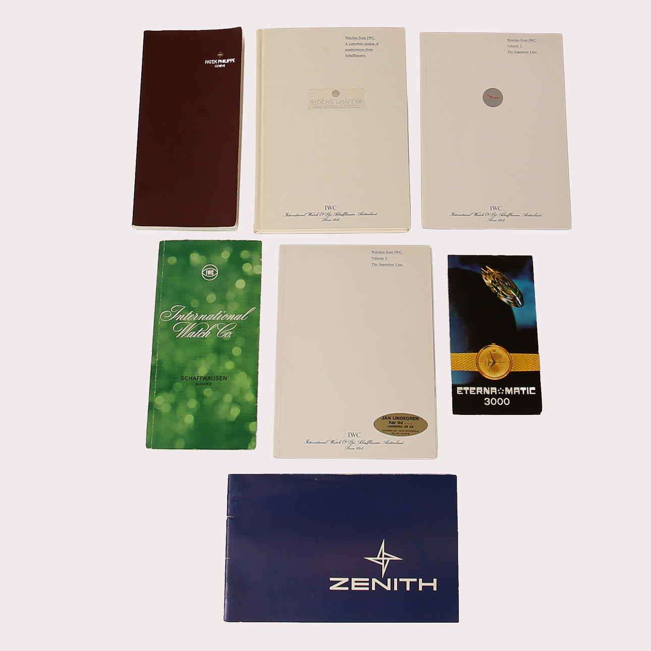Brochures IWC, Zenith and Patek Philippe, 7 pcs.