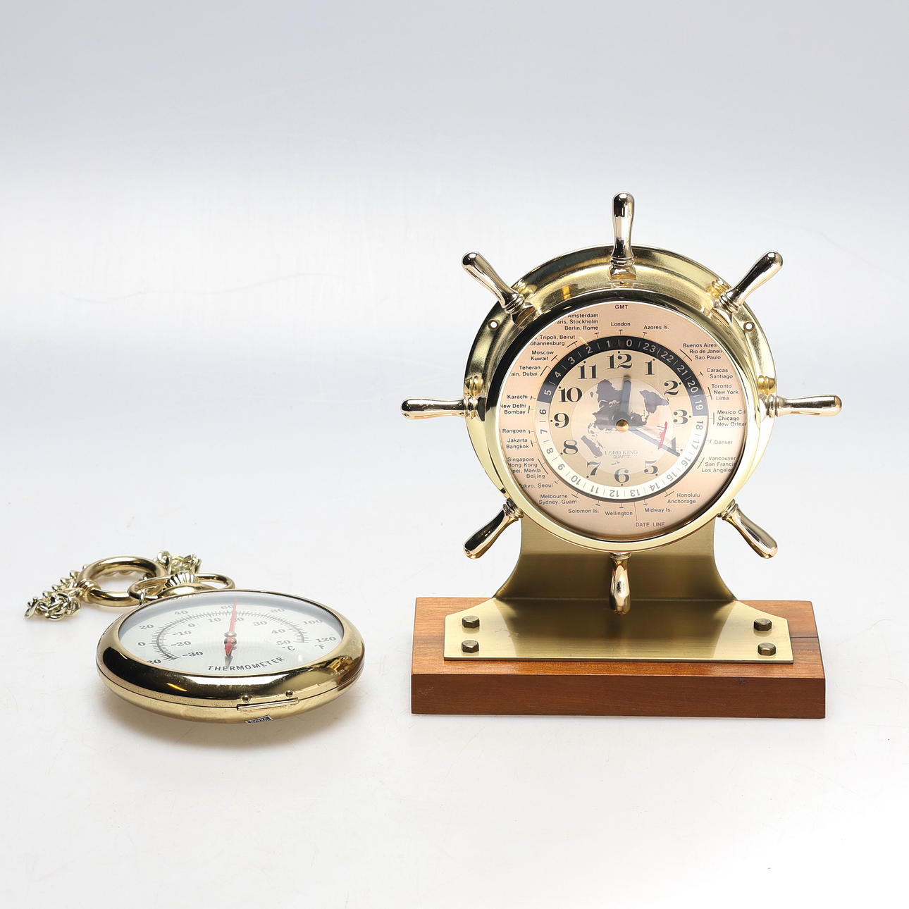 TABLE CLOCK AND THERMOMETER.
