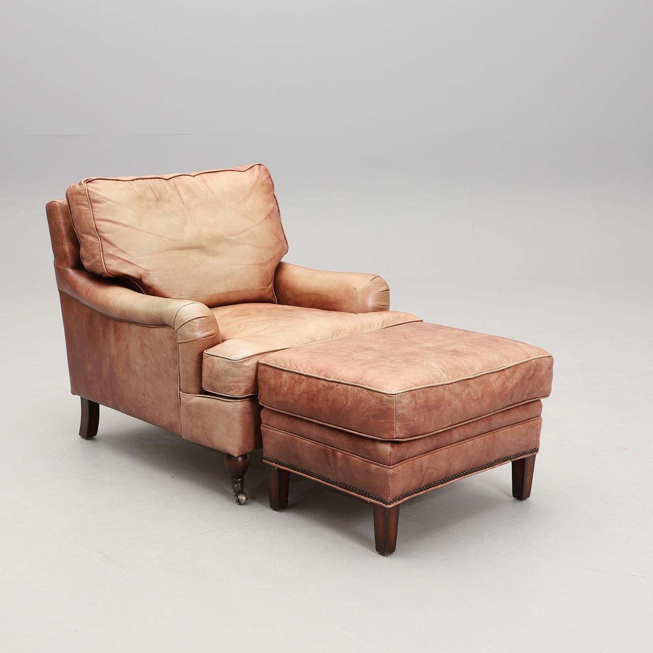 ARMCHAIR with FOOTSTOOL, Howard model.