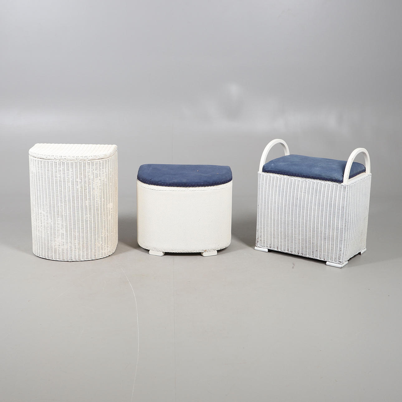 TWO LLOYD LOOM LINEN BASKETS AND ANOTHER.