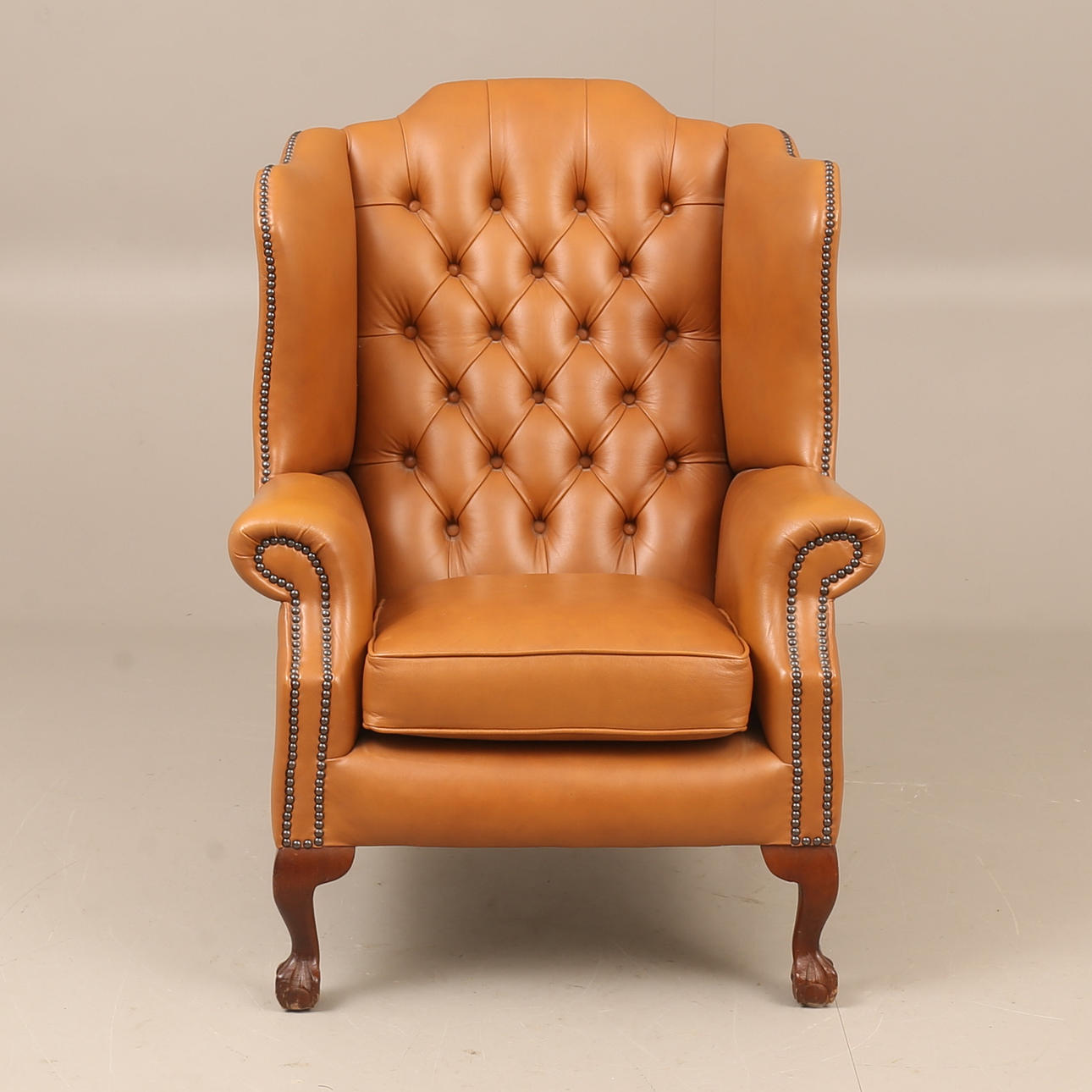 ARMCHAIR, wingback model, 20th century.