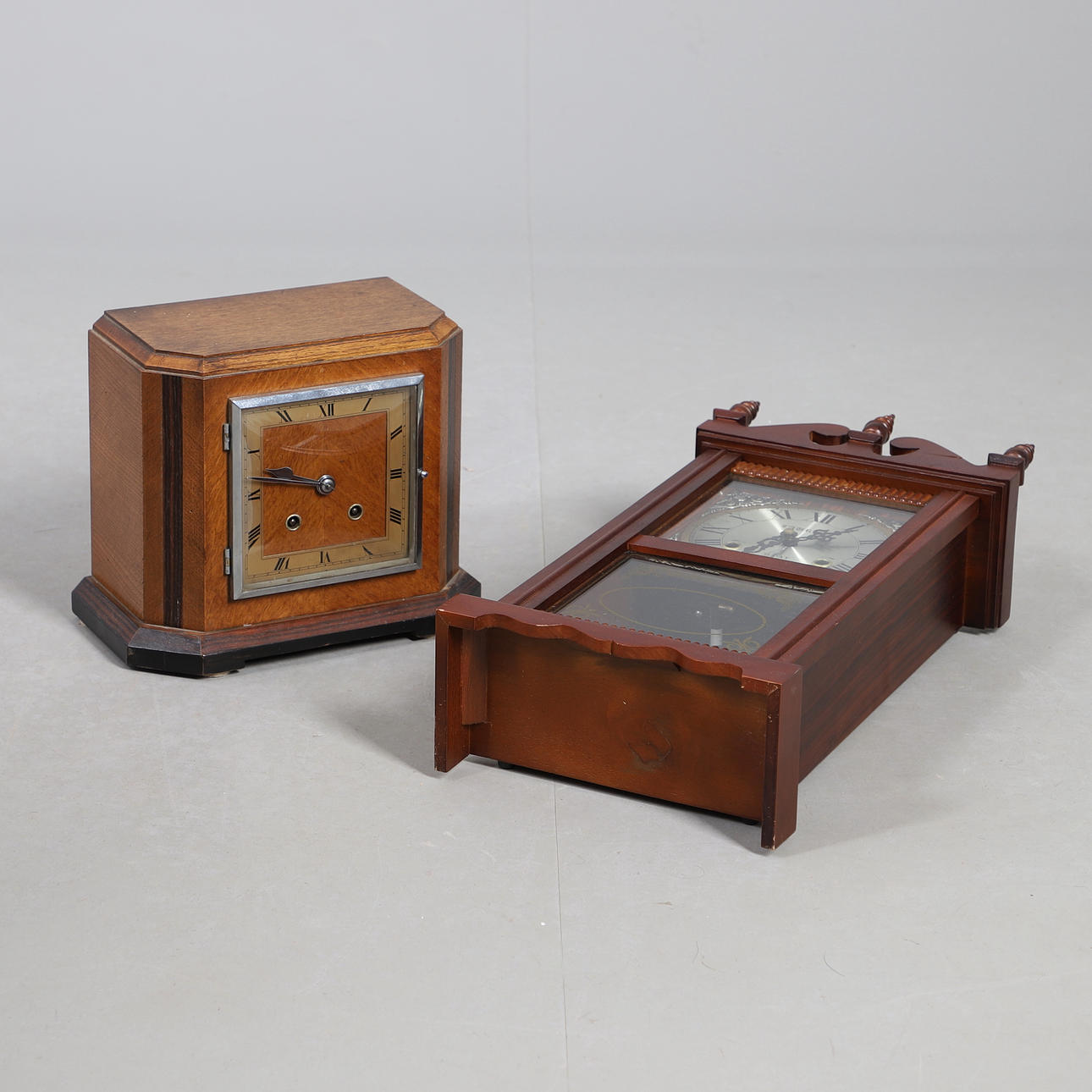 A 1940S MANTLE CLOCK AND A LAURAIN WALL CLOCK.