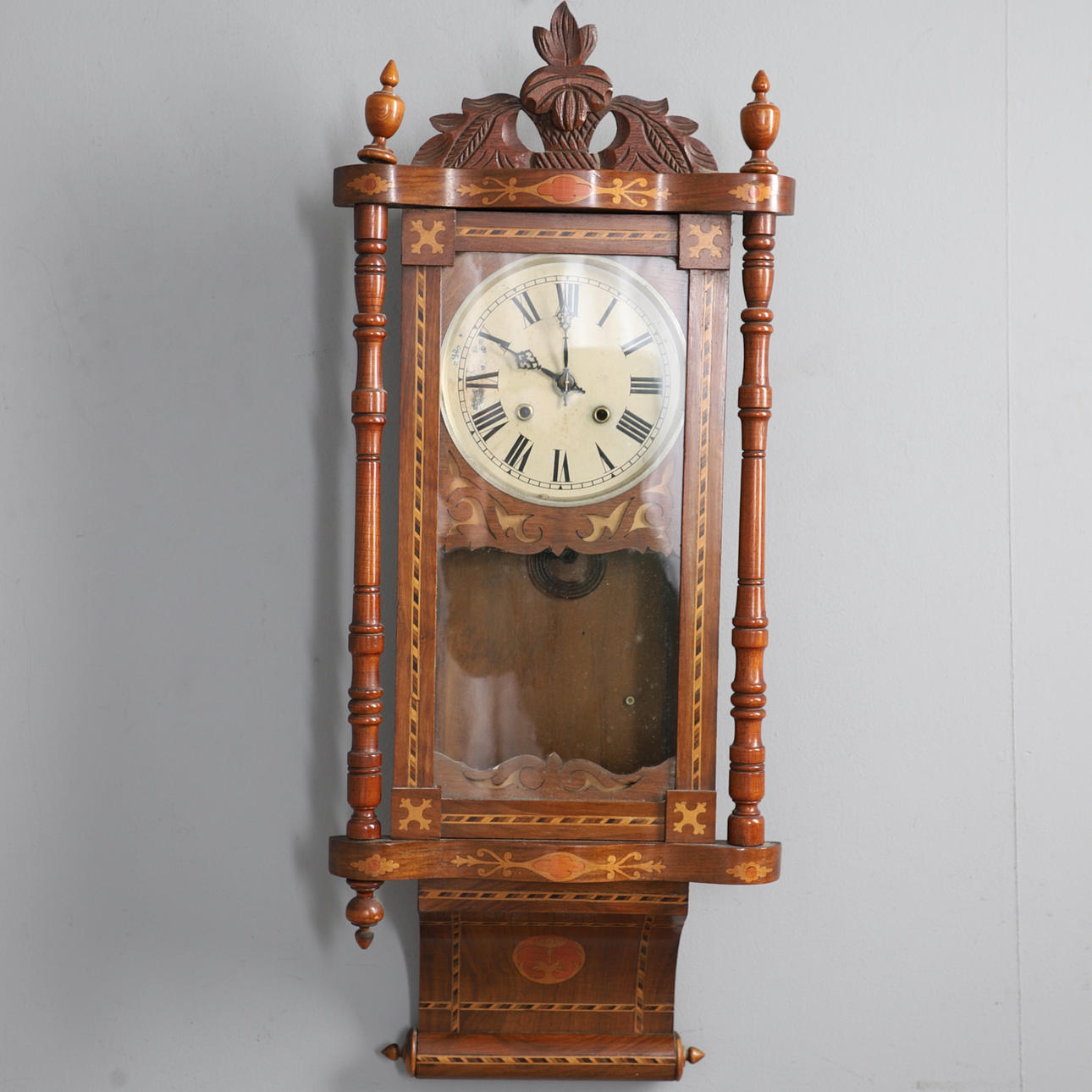 A VICTORIAN INLAID WALL CLOCK.