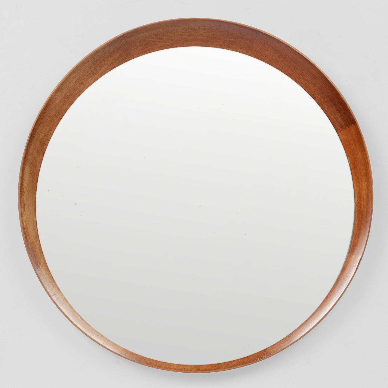 TH. POSS` EFTF. Circular wall mirror with frame of solid teak, Copenhagen, Denmark, 1950s/60s.