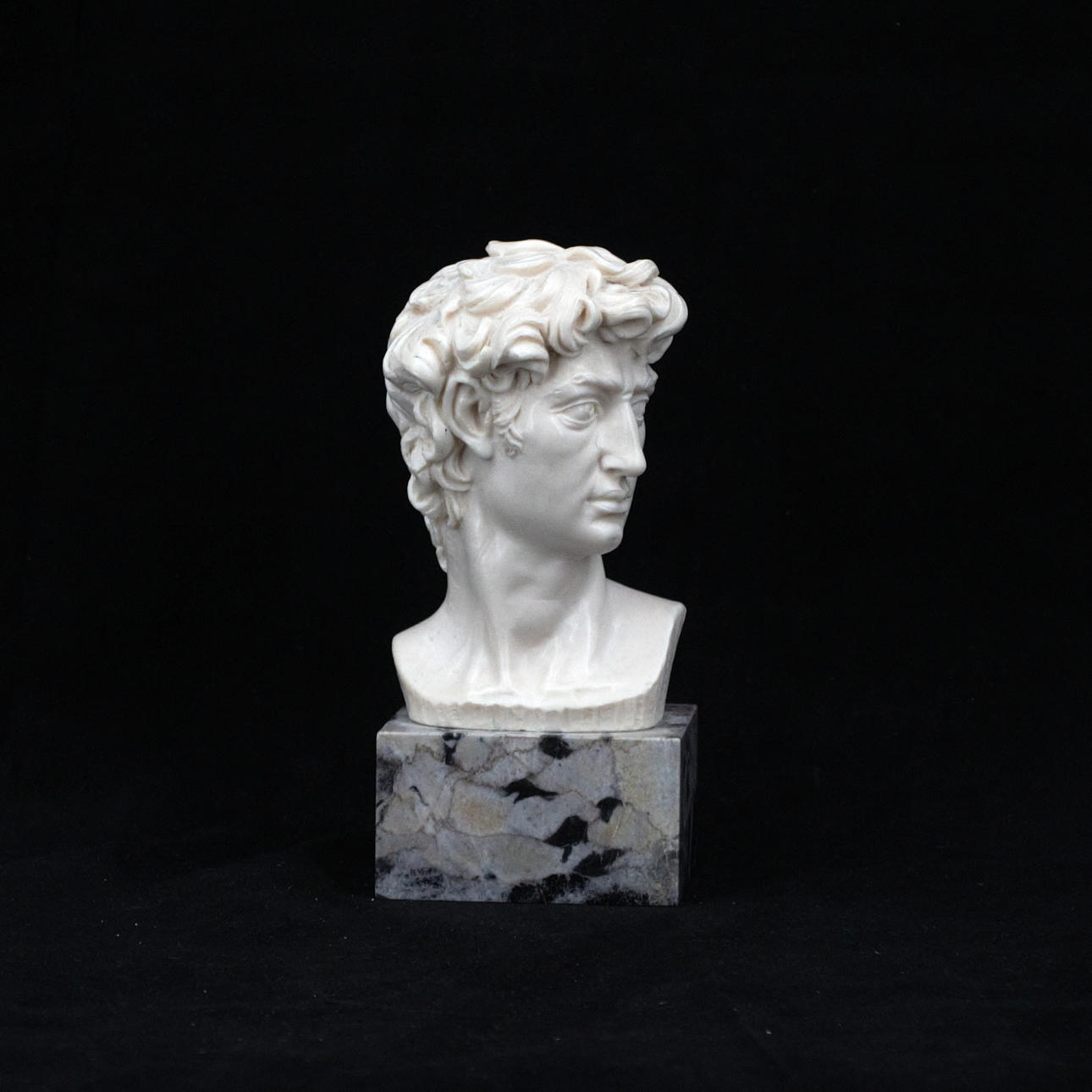 FIGURINE, bust, composition material, stone base, Italy, contemporary.