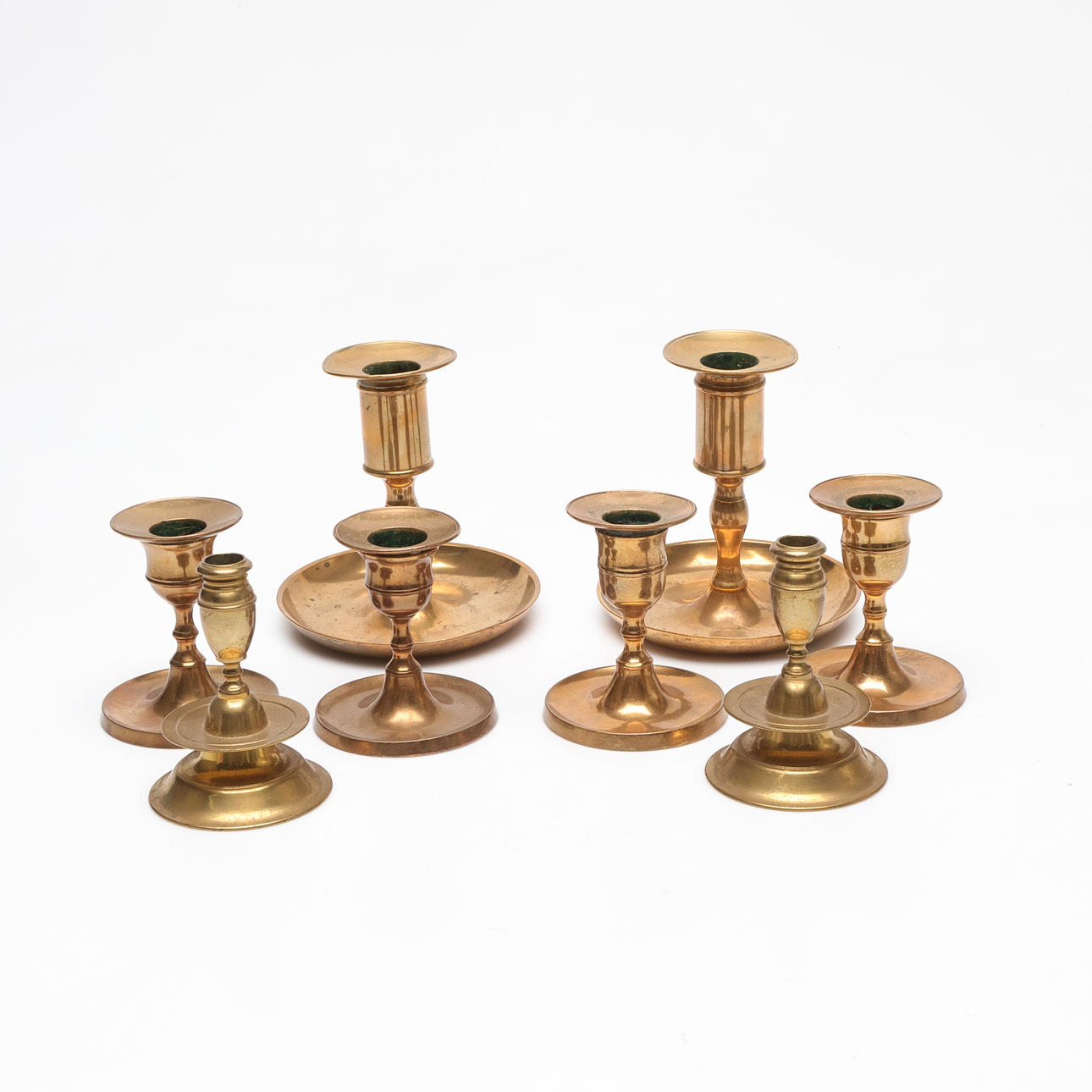 CANDLESTICKS, 8 pieces, brass.