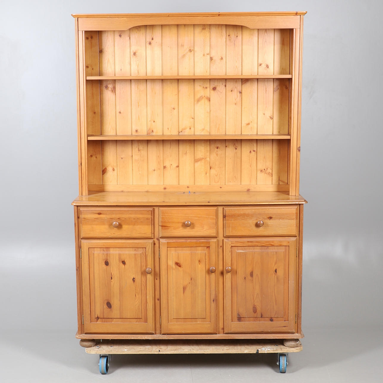 A MODERN PINE DRESSER.
