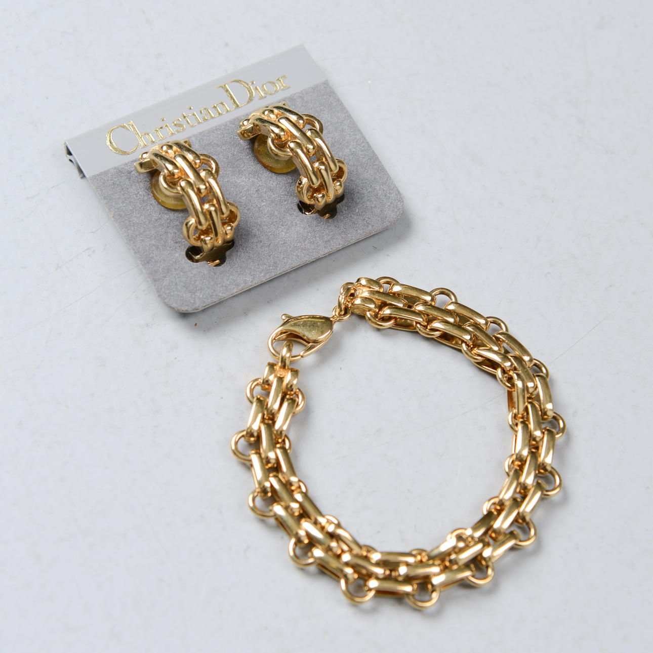 CHRISTIAN DIOR, bracelet & earrings.