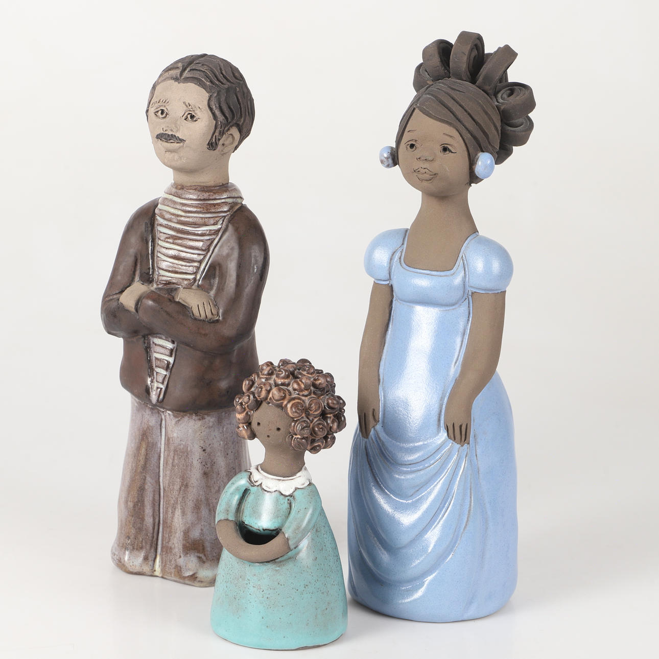 FIGURINES, 3 pieces, partially glazed ceramic, Elbogen.