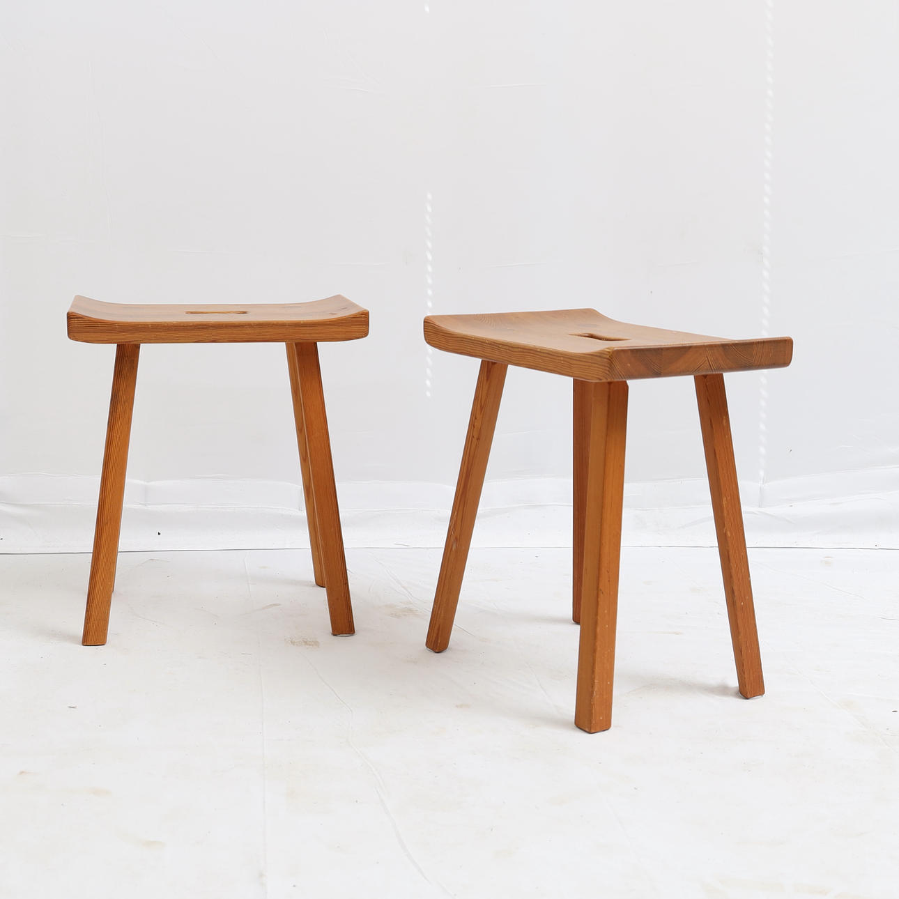 CARL MALMSTEN. Stools a pair, "Visingsö" Pine, branded "CM".