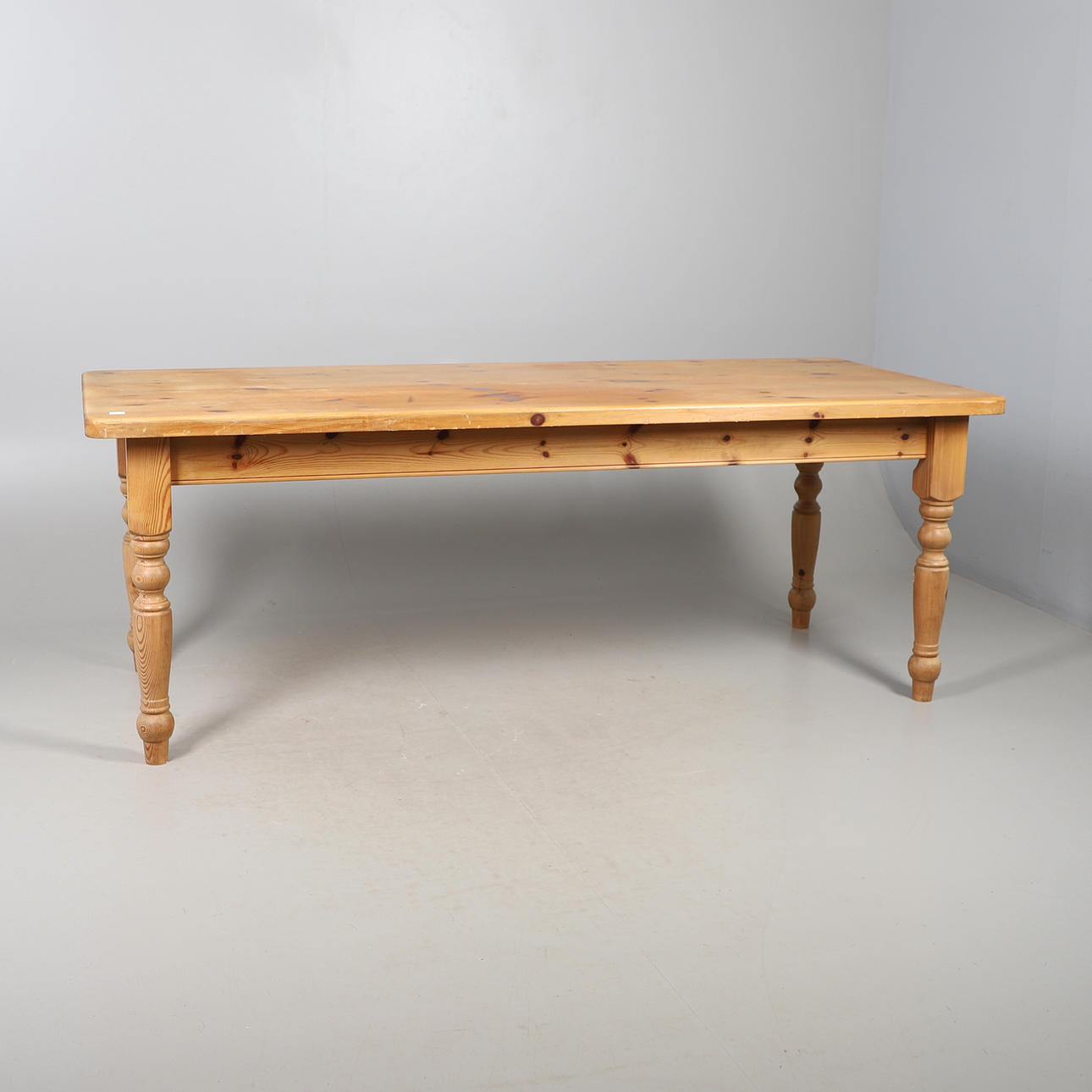 A MODERN PINE FARMHOUSE TABLE.