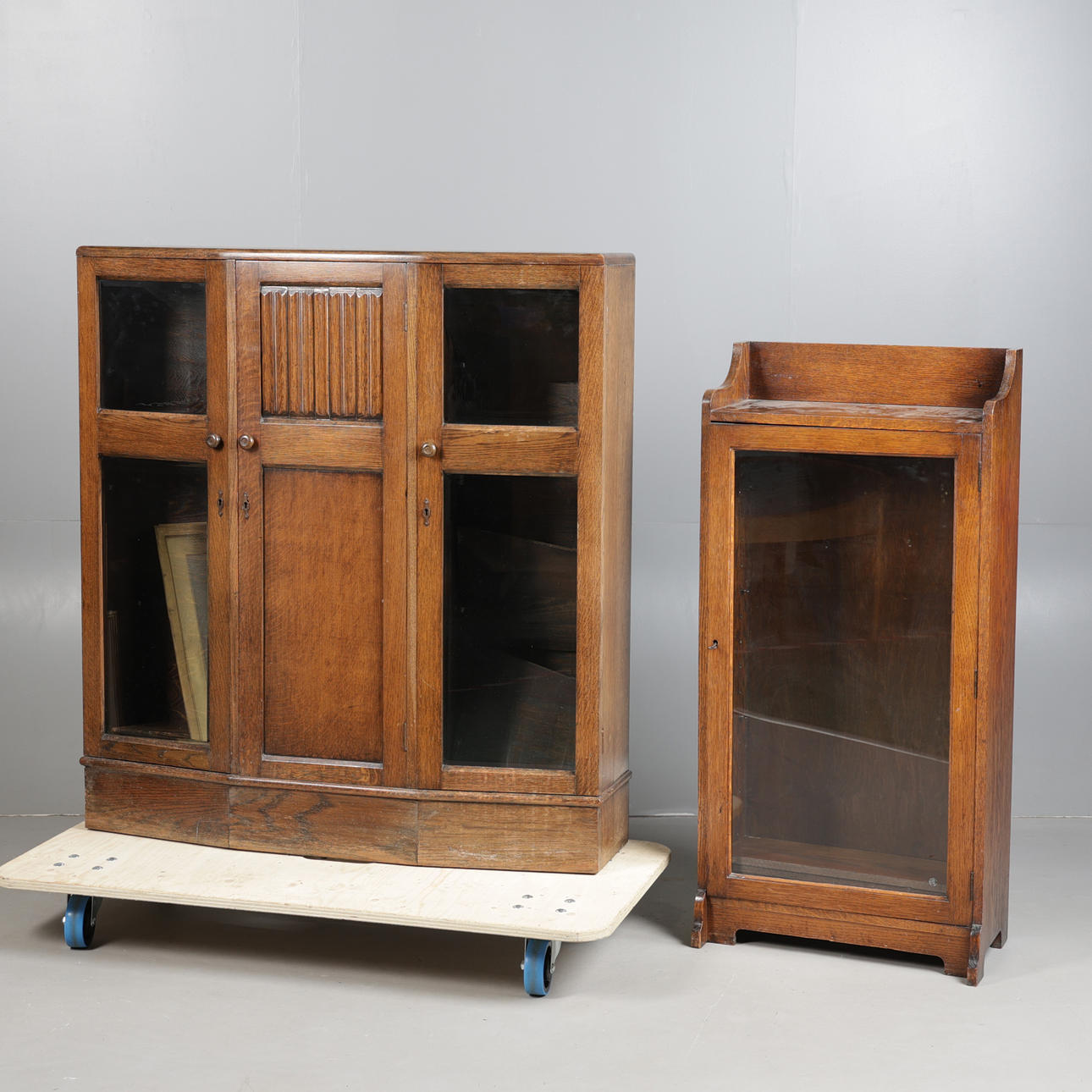 TWO OAK AND GLAZED BOOKCASES (2).