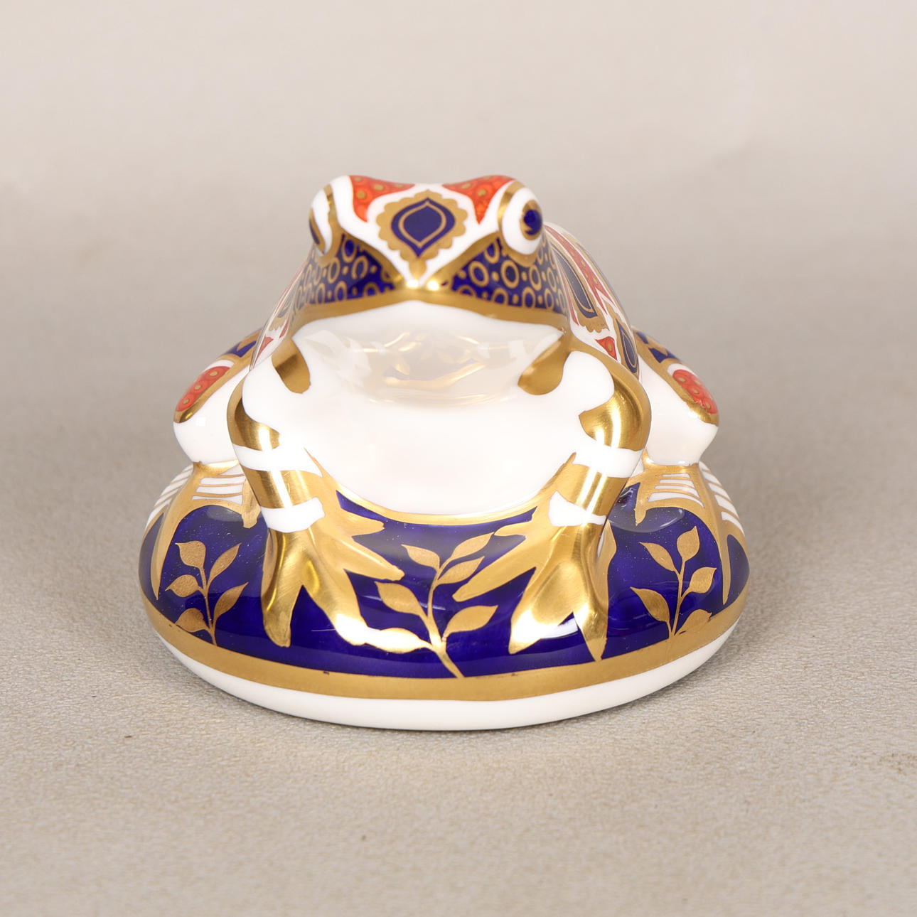 A ROYAL CROWN DERBY FROG.