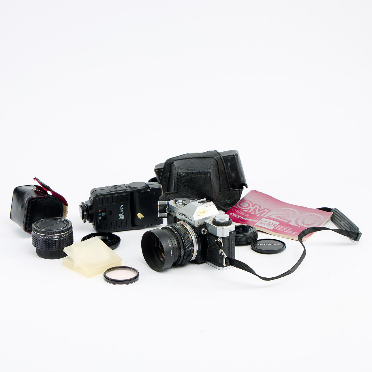 CAMERA Olympus OM20 with accessories no. 1353017.