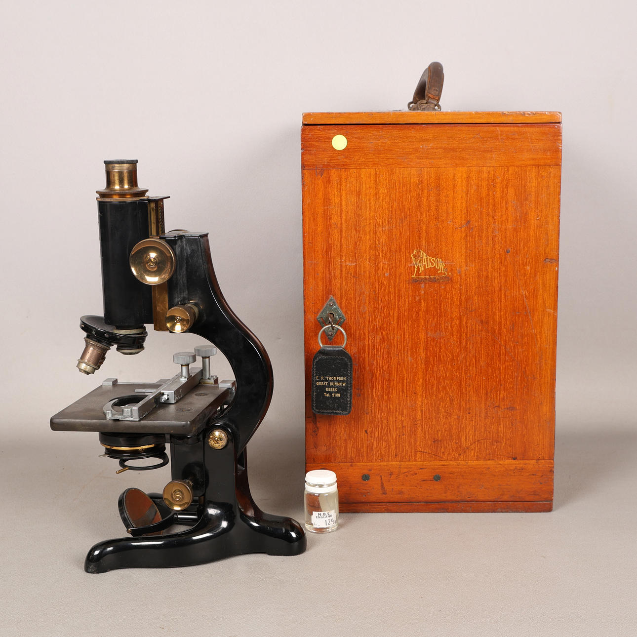 A CASED W, WATSON & SONS "SERVICE" MICROSCOPE.