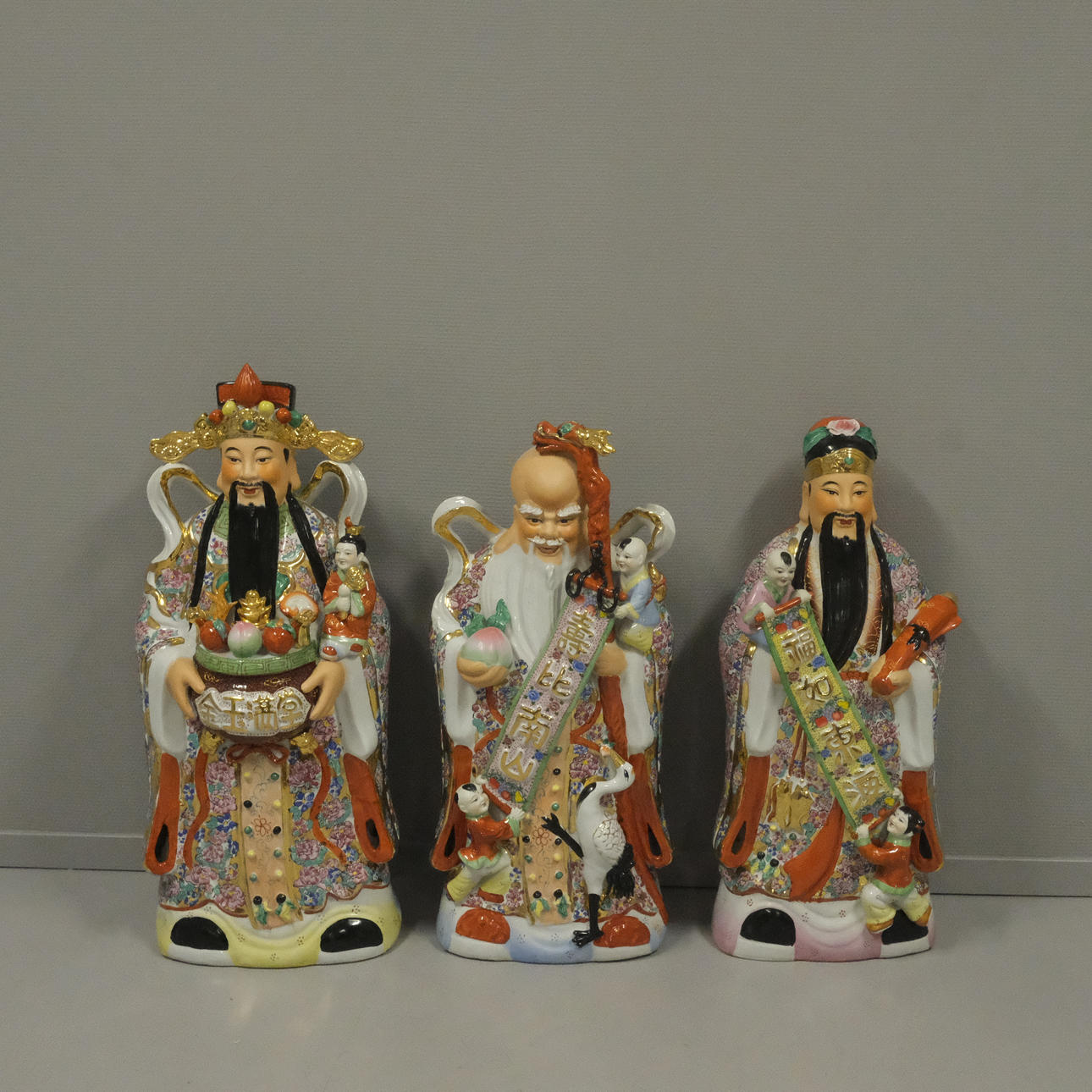 THREE LARGE FIGURES, CHINA.