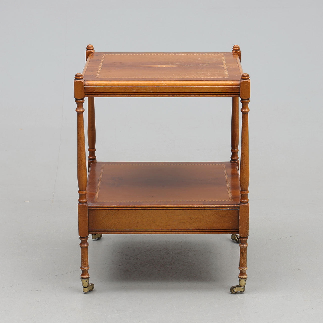 LAMP TABLE. With inlay, on casters, 20th century.