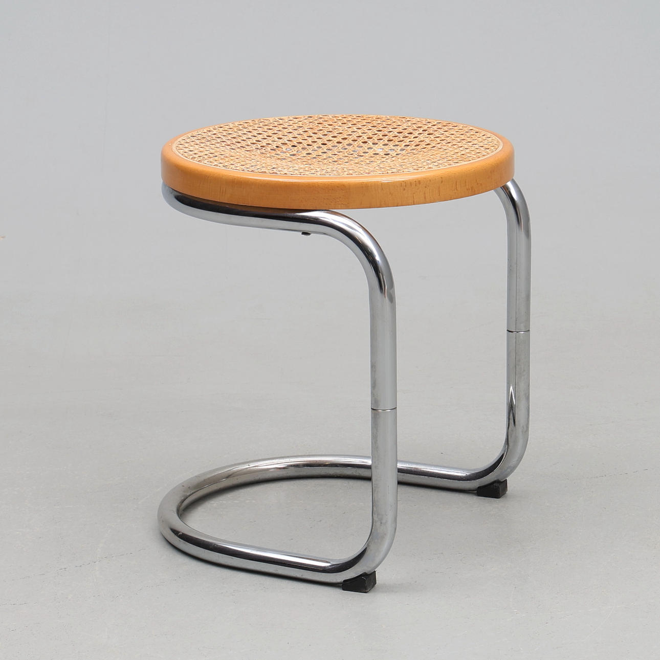 STOOL. Rattan, chrome base, Bauhaus style.