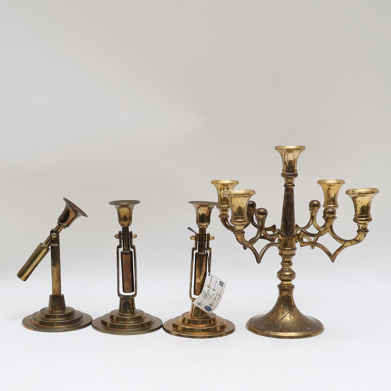 CANDLESTICKS, 4 pieces, brass.
