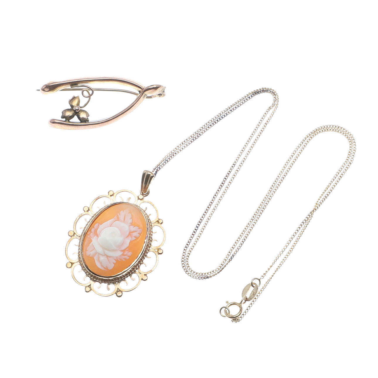 A 9CT GOLD MOUNTED CAMEO PENDANT.