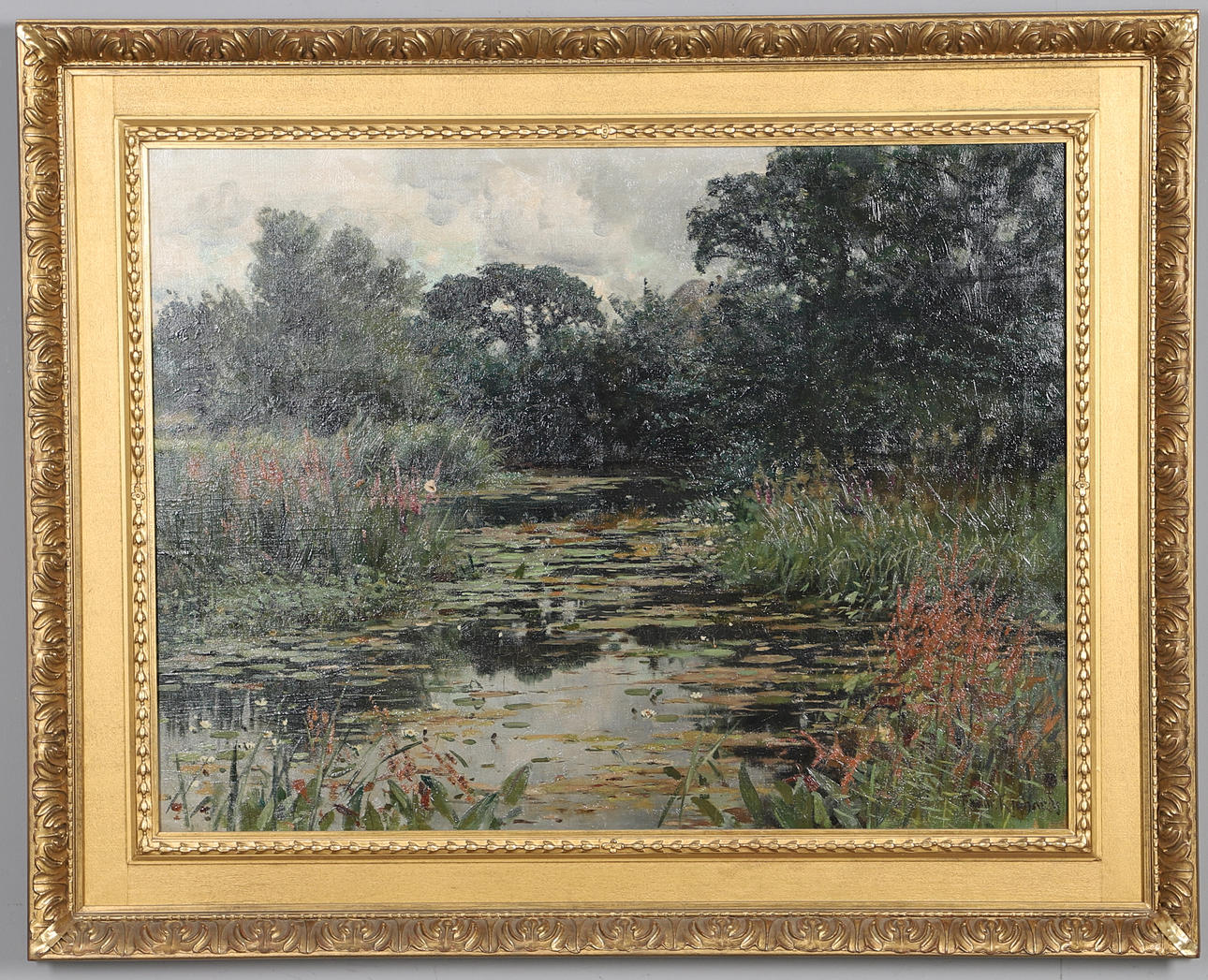 FRANK RICHARDS R.B.A (1863-1935). SUMMER RIVER LANDSCAPE WITH REEDS AND WATER LILIES.
