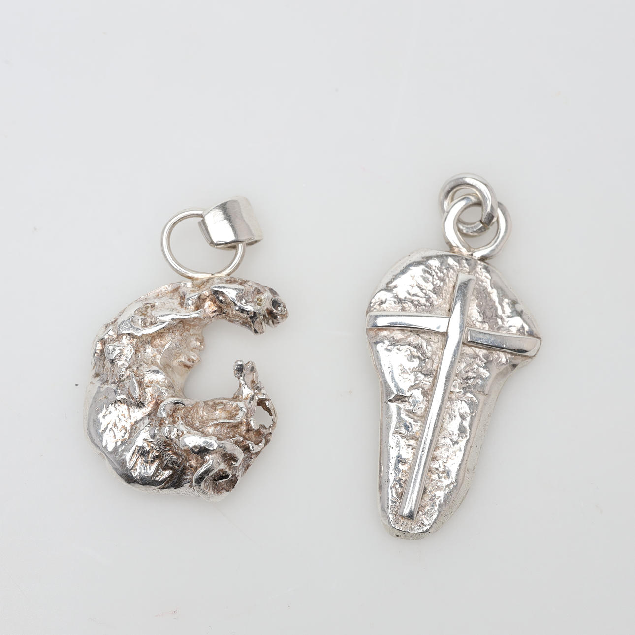 CHARMS 2 pieces, silver, weight approx. 41 grams.